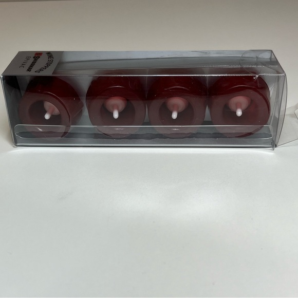 Swissmar wine stoppers. 4 pack. Never used and in unopened pack. Color: Burgundy - Picture 2 of 7